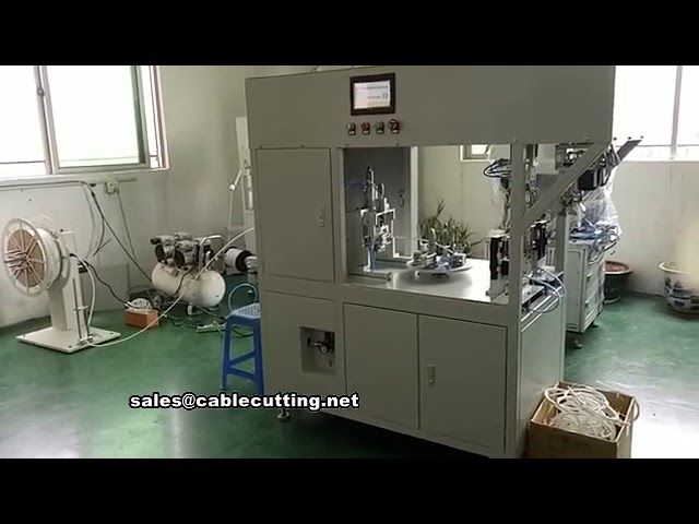 Macchina automatica per taglio, avvolgimento e legatura di cavi e fili con fascetta metallica